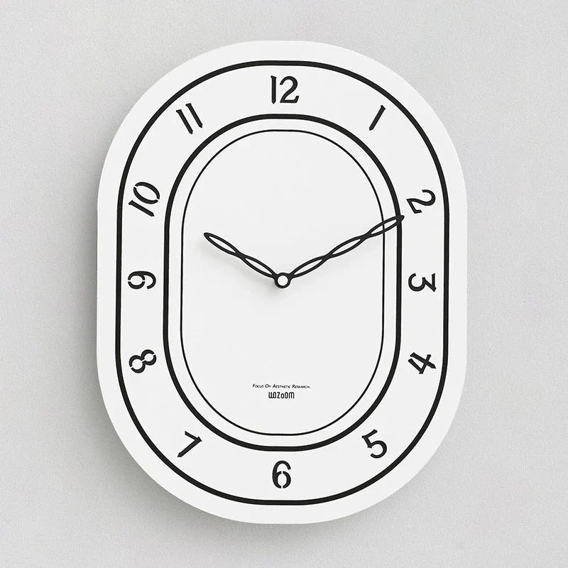 Black & White Silent Oval Wall Clock – Laser Engraved Roman Design - Tegulane Global