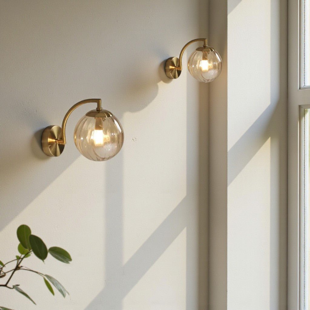 Gold Wall Sconce with Ribbed Glass Globe - Tegulane Global