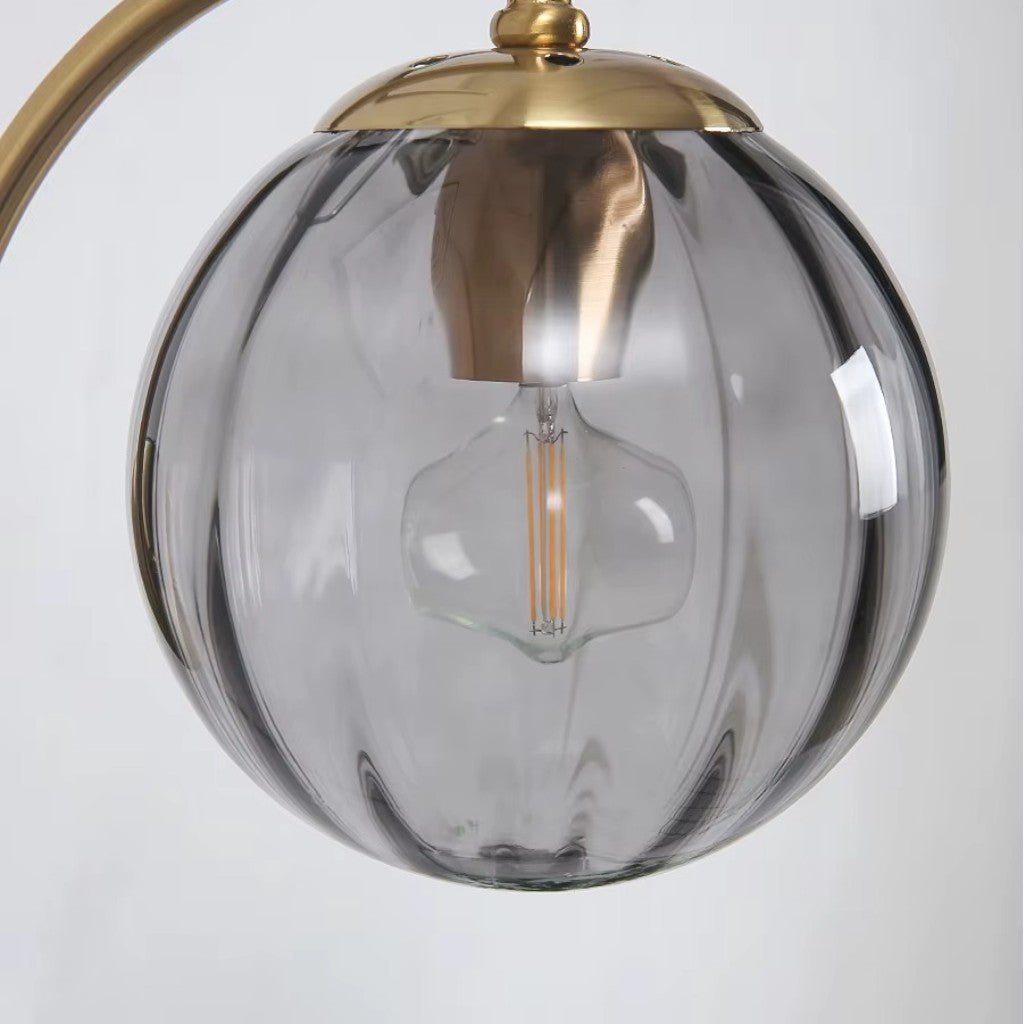 Gold Wall Sconce with Ribbed Glass Globe - Tegulane Global