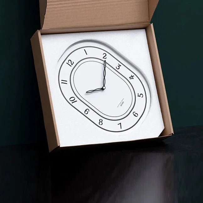 Black & White Silent Oval Wall Clock – Laser Engraved Roman Design - Tegulane Global