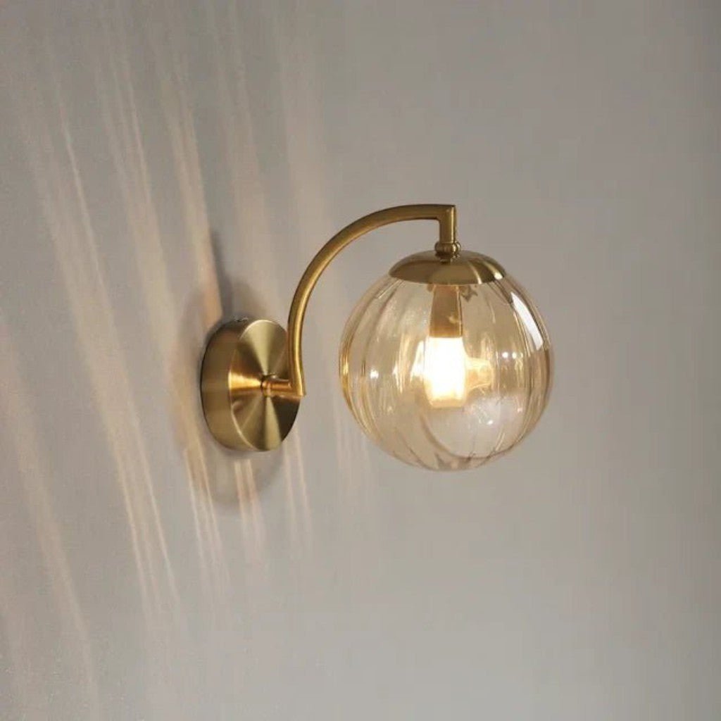 Gold Wall Sconce with Ribbed Glass Globe - Tegulane Global