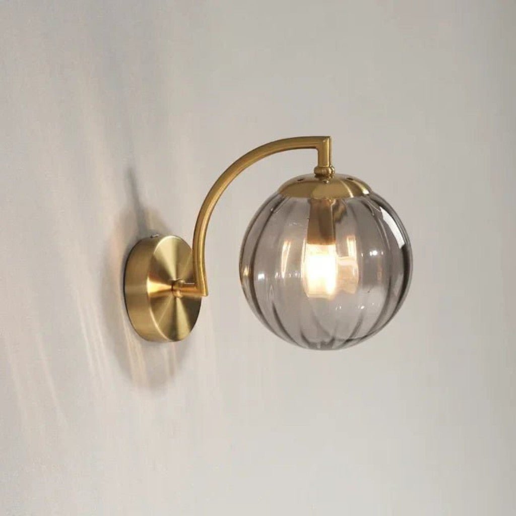 Gold Wall Sconce with Ribbed Glass Globe - Tegulane Global