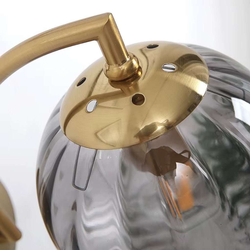 Gold Wall Sconce with Ribbed Glass Globe - Tegulane Global