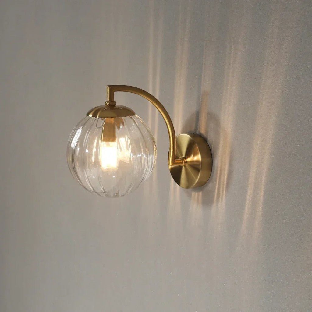 Gold Wall Sconce with Ribbed Glass Globe - Tegulane Global